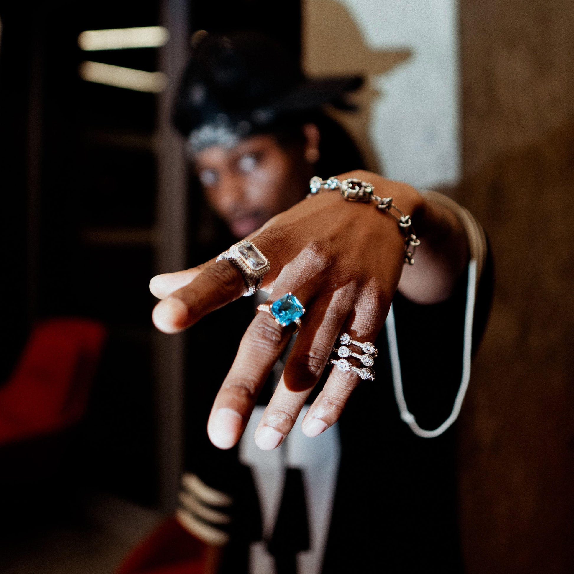 Man wearing blue Carly Asymmetric Gemstone Ring - asymmetrical ring by Disco Eros Finos aka DEF Jewelry (blue)