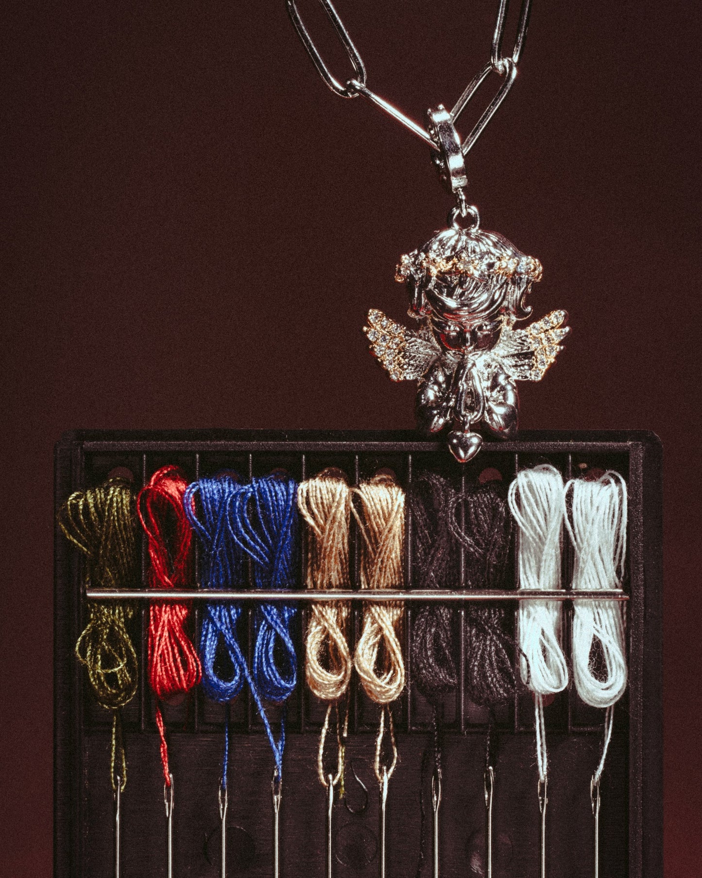 Editorial shoot for The Eros Necklace - Handmade cable link chain with cupid angel pendant - handmade by DEF Jewelry aka Disco Eros Finos