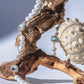 Editorial shoot of GEMS AND PEARLS SIGNATURE BRADED NECKLACE - Disco Eros Finos -Handmade jewelry pearls crystal gems rings and chains (blue)