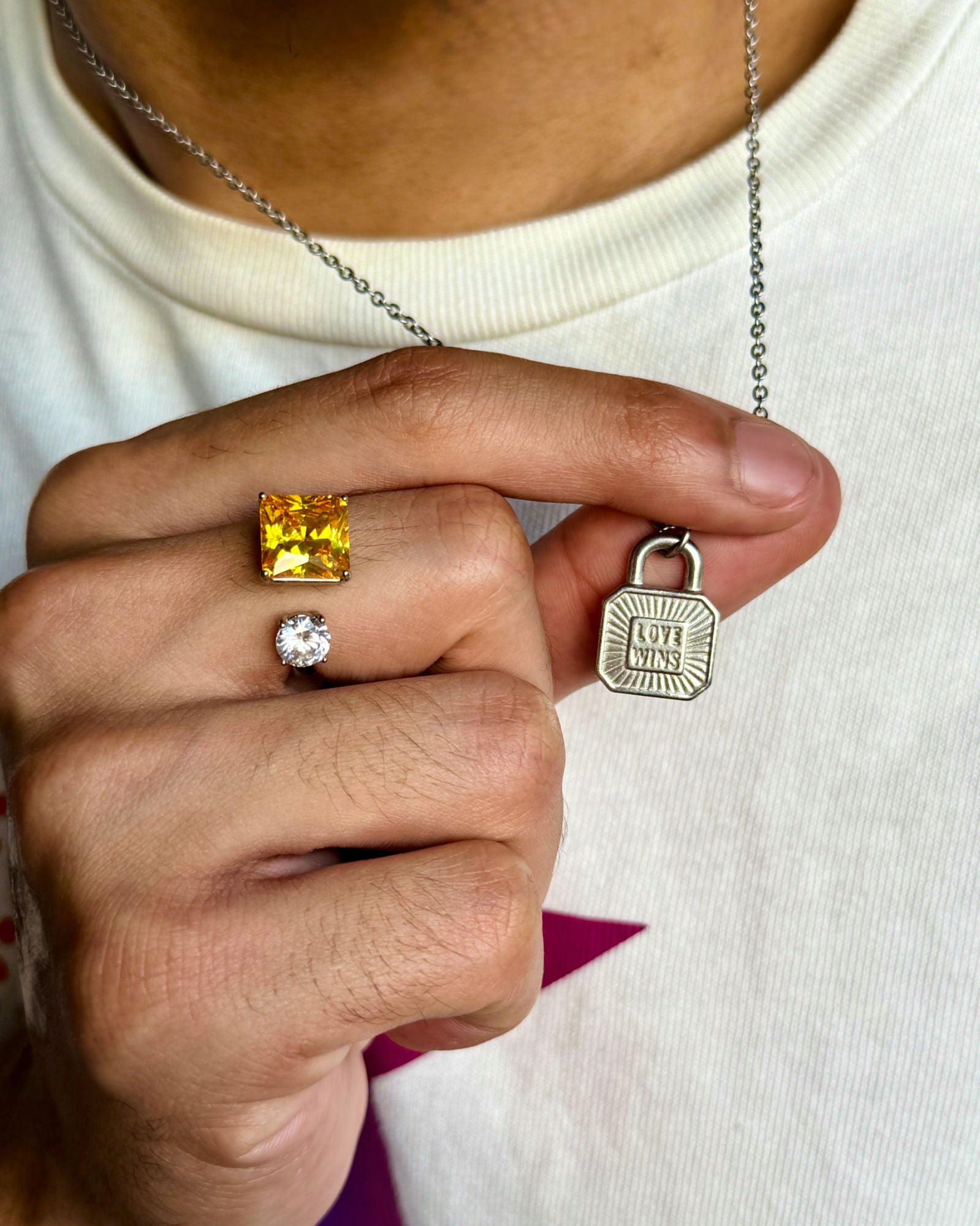 Male model wearing love Wins Lock pendant Necklace - Pride month special, non-tarnish Stainless steel chain by DEF Jewelry
