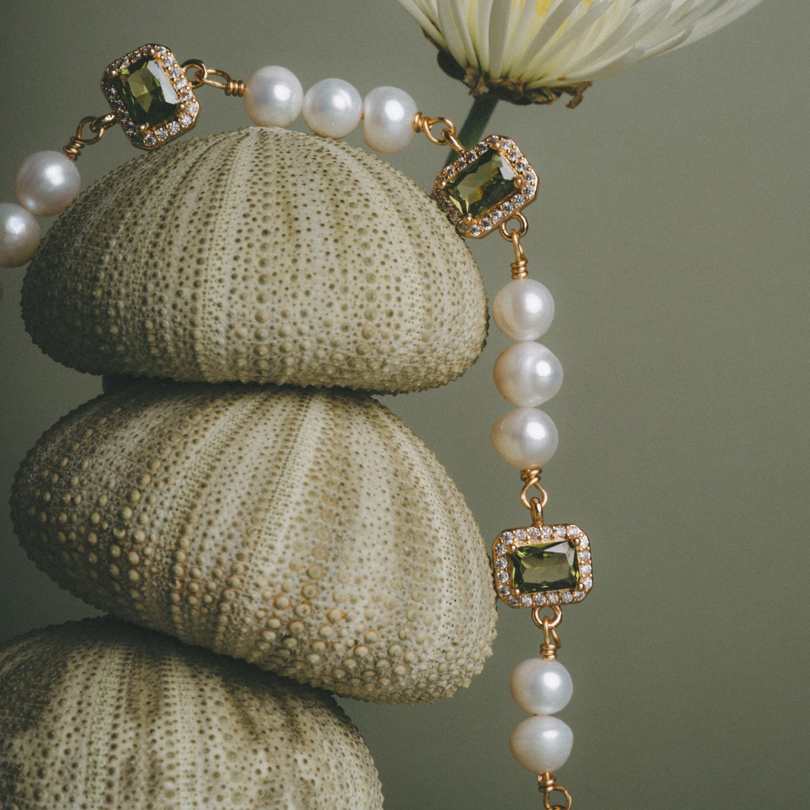 Editorial shoot of GEMS AND PEARLS SIGNATURE BRADED BRACELET - Disco Eros Finos -Handmade jewelry pearls crystal gems rings and chains (matcha)