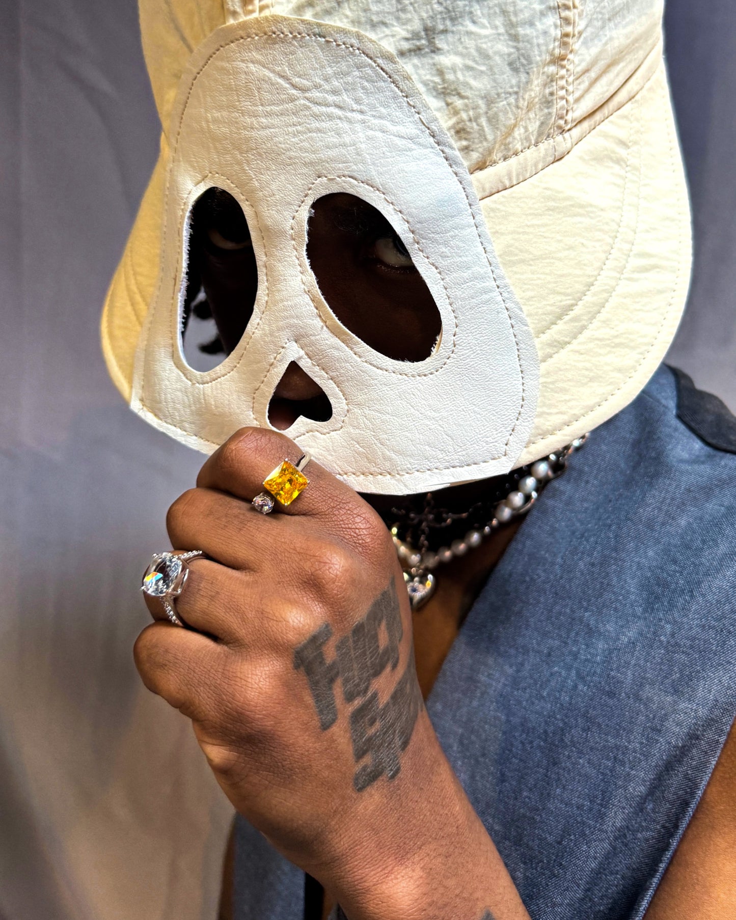 Male model wearing Prism Arc Open Ring by Disco Eros Finos