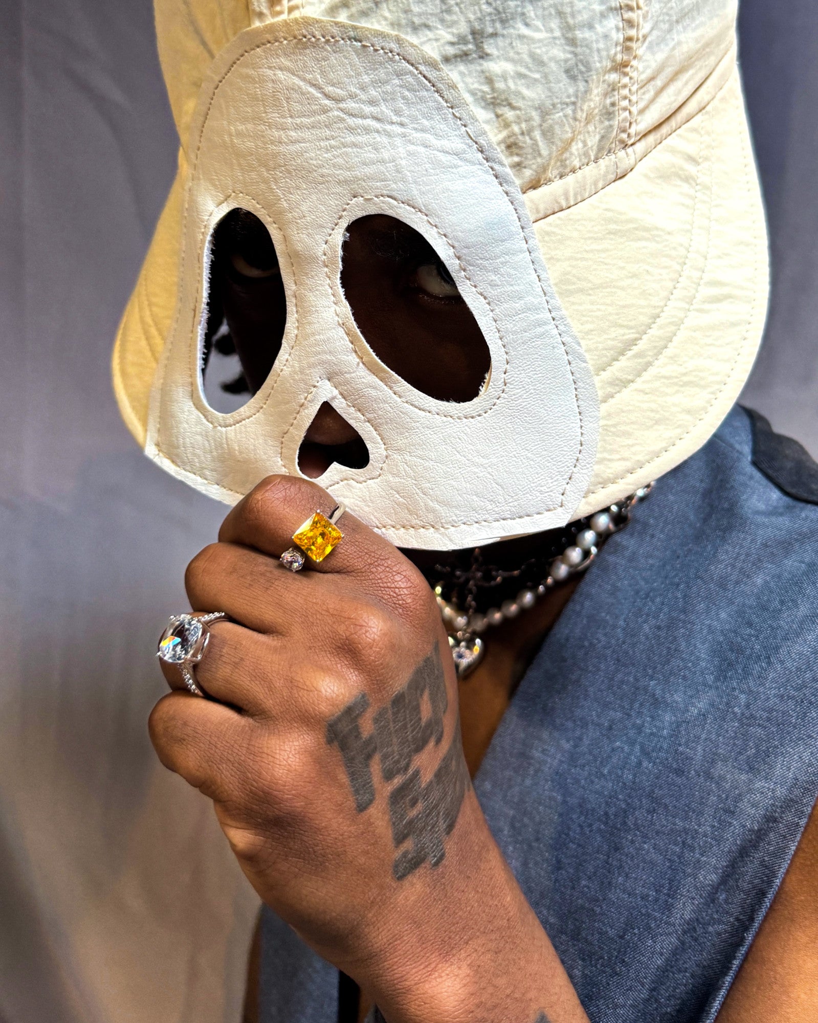 Male model wearing Prism Arc Open Ring by Disco Eros Finos