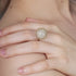 Hand wearing the Sparkling Disco Ball Open Ring by DEF Jewelry, close-up view